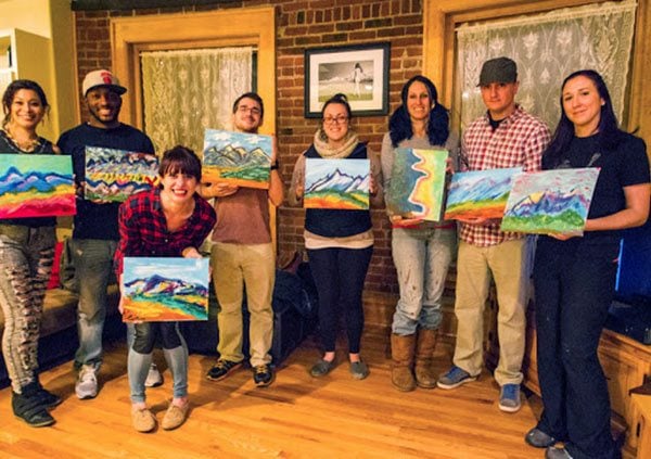 420-friendly Painting Class Guests with artwork 