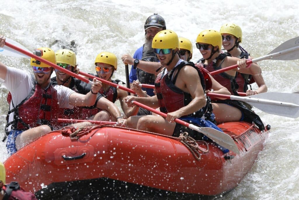8 individual on a whitewater rafting tour on a Colorado river